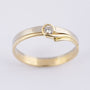Wit/geel gouden ring met een briljant