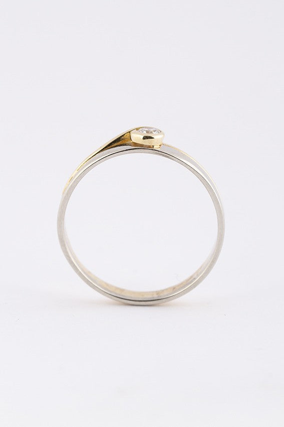 Wit/geel gouden ring met een briljant