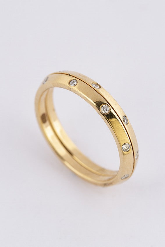 Gouden aanschuif ringen met in elk briljanten