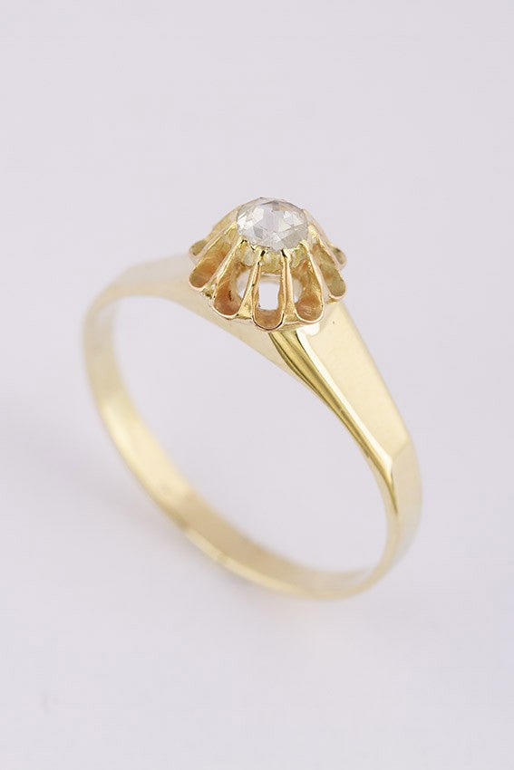Old gold solitaire ring with a rose-cut diamond