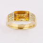 Gold band ring with faceted citrine and brilliants