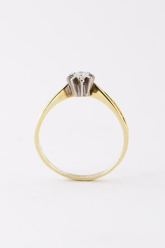 Gouden solitair ring met een briljant