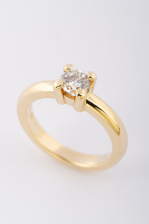 Gold solitaire ring