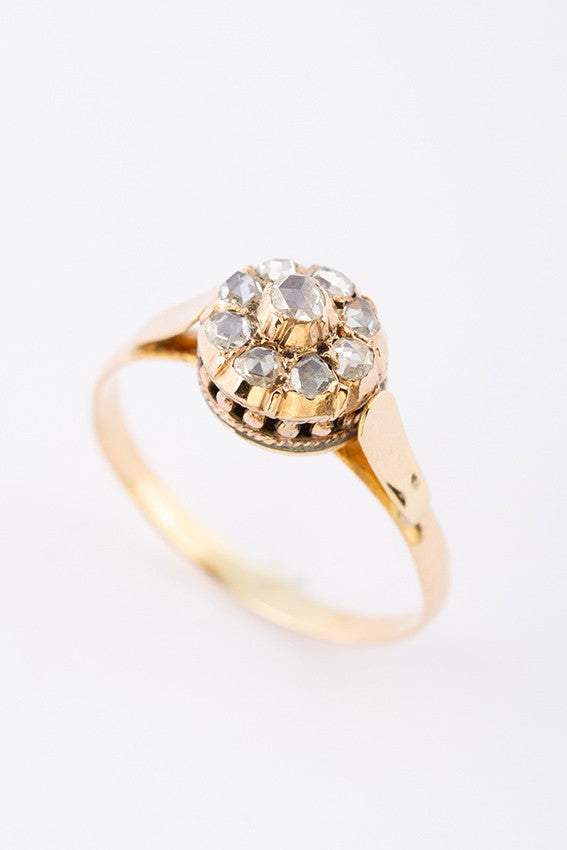 Gold entourage ring with rose-cut diamonds