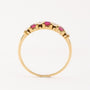 Gold row ring with brilliant and ruby