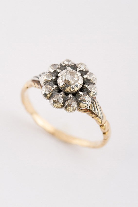 Gold entourage ring with rose-cut diamonds