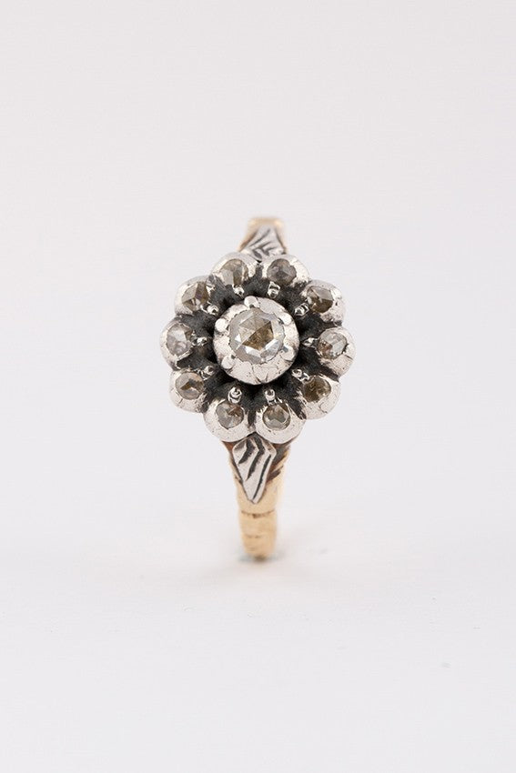Gold entourage ring with rose-cut diamonds