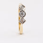 Gold row ring with 3 old-cut diamonds