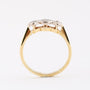 Gold row ring with 3 old-cut diamonds