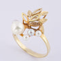 Gold ring with various pearls