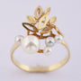 Gold ring with various pearls