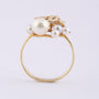 Gold ring with various pearls