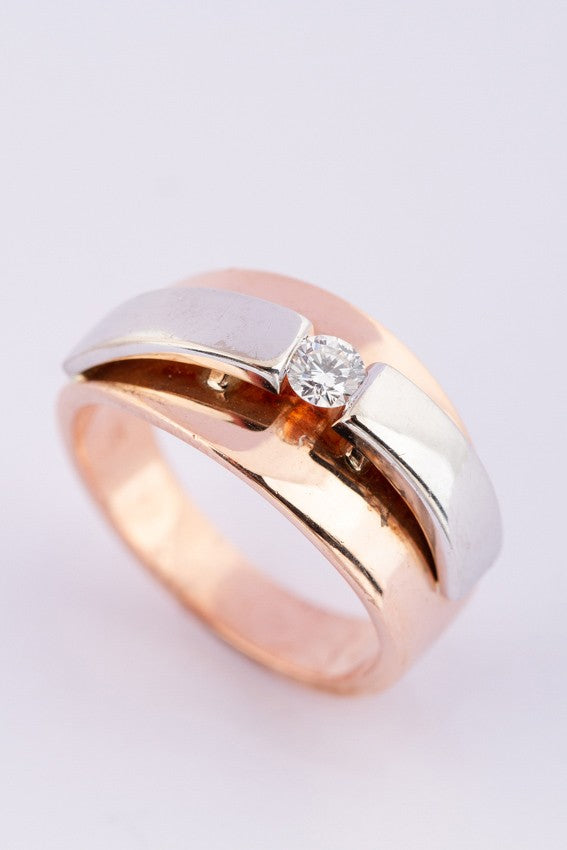 White/rose gold ring with brilliant