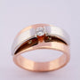 White/rose gold ring with brilliant