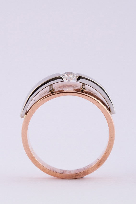 White/rose gold ring with brilliant