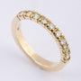 Gold row ring with 9 diamonds