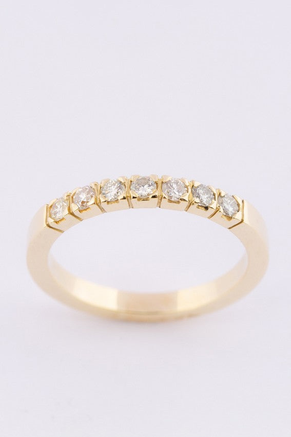 Gouden rij ring met 7 briljanten