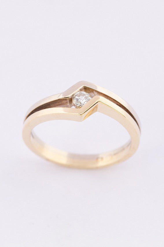 Wit/geel gouden ring met een briljant