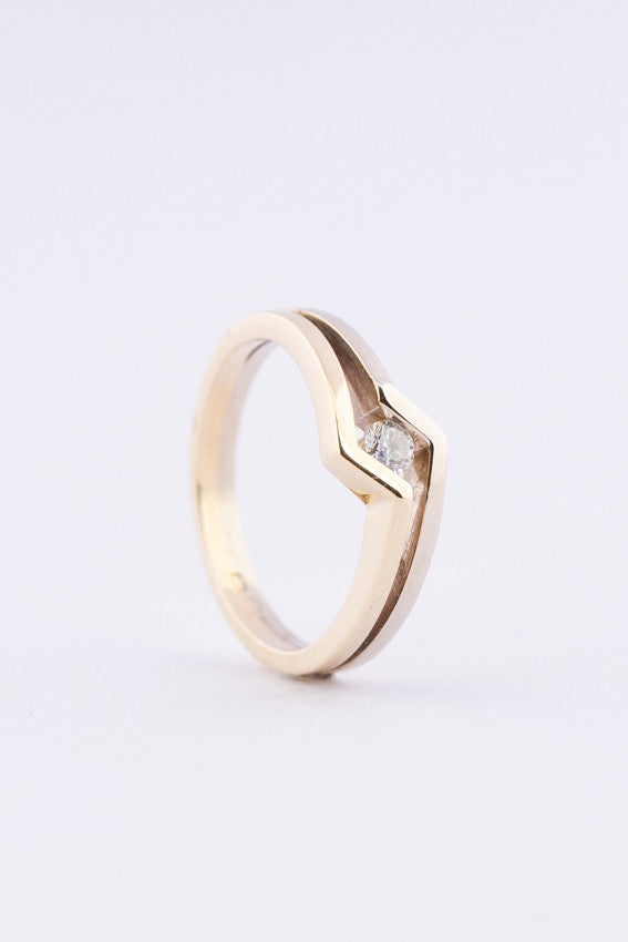 Wit/geel gouden ring met een briljant