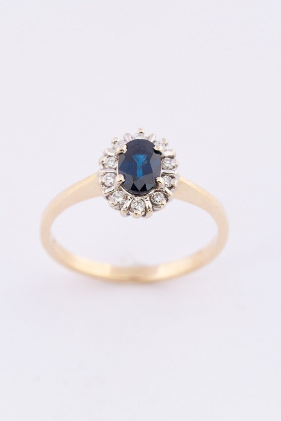 Gouden entourage ring met saffier en 10 briljanten