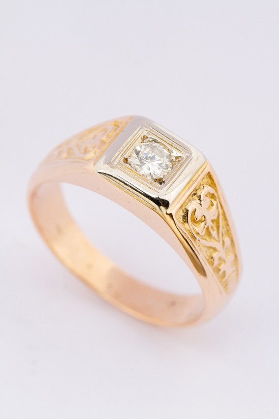gouden bewerkte heren ring met een briljant