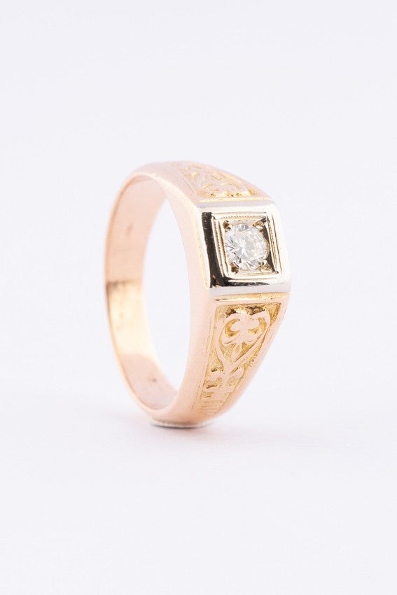 gouden bewerkte heren ring met een briljant