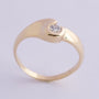 gold ring with a brilliant