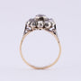 Gold entourage ring with an old-cut brilliant and rose-cut diamonds.
