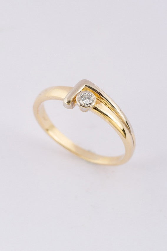 wit/geel gouden ring met een briljant