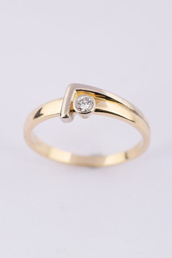 wit/geel gouden ring met een briljant