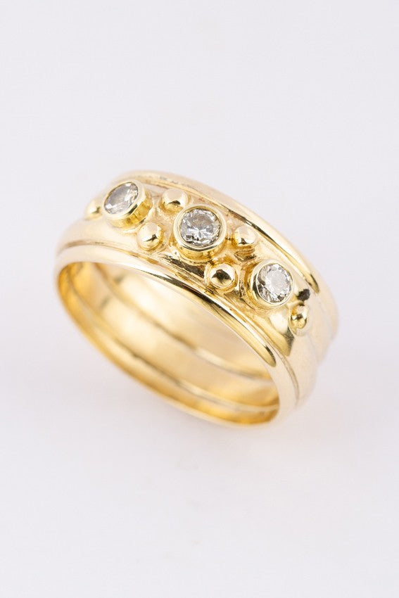 Gouden band ring met 3 briljanten