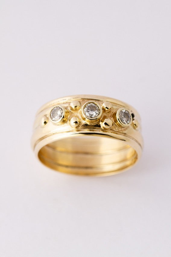 Gouden band ring met 3 briljanten