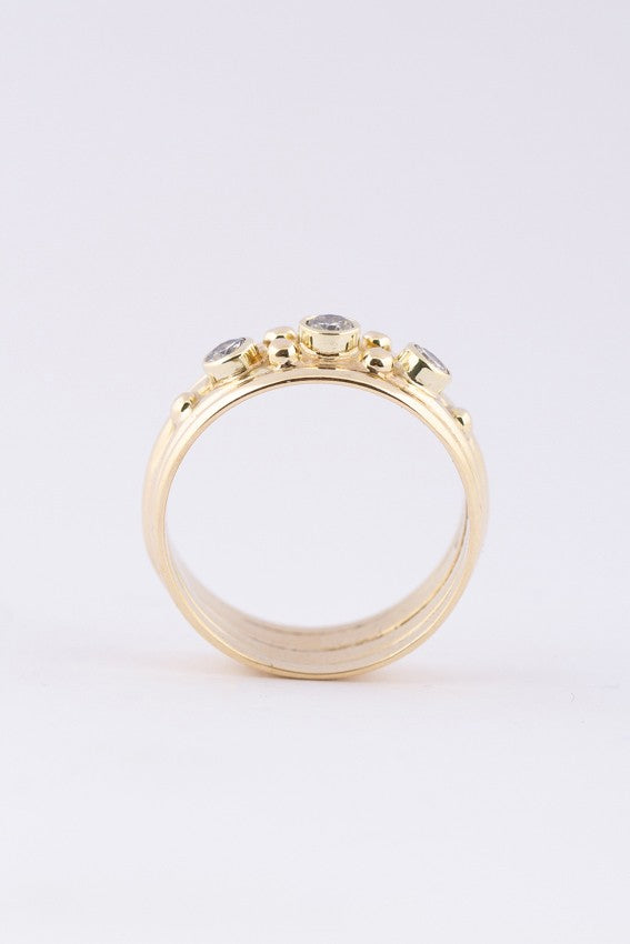 Gouden band ring met 3 briljanten
