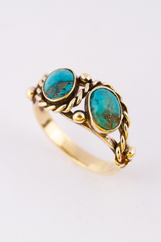 Gouden ring met 2 turkooizen