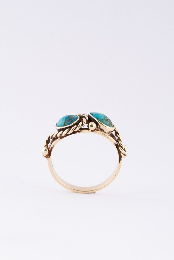 Gouden ring met 2 turkooizen