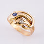 Gouden slangenring met saffier en diamant