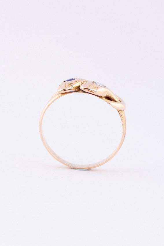 Gouden slangenring met saffier en diamant