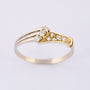 Gold ring with diamond and brilliant