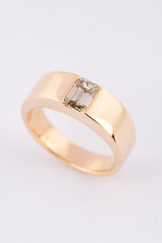 Gold ring with a 1 ct. diamond (emerald cut)