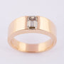 Gold ring with a 1 ct. diamond (emerald cut)