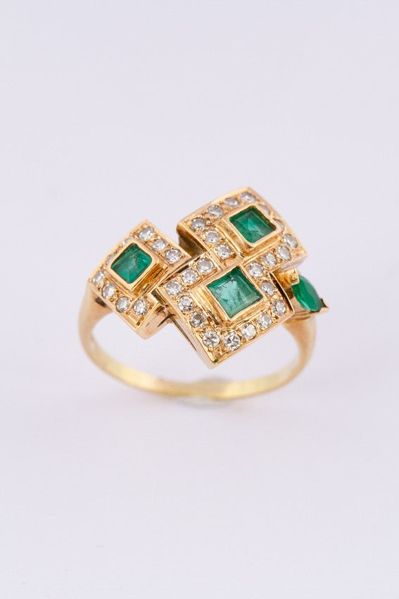 Gold ring with diamonds and emeralds