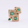 Gold ring with diamonds and emeralds