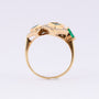 Gold ring with diamonds and emeralds