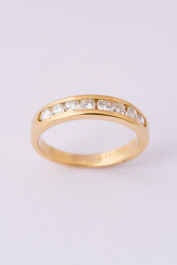 Gouden rij ring met 8 briljanten