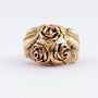 Gouden ring met roos motieven