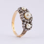 Antique gold entourage ring with cultured pearls and Bolshevik-cut diamonds