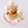 Golden artistic ring with cultured pearls