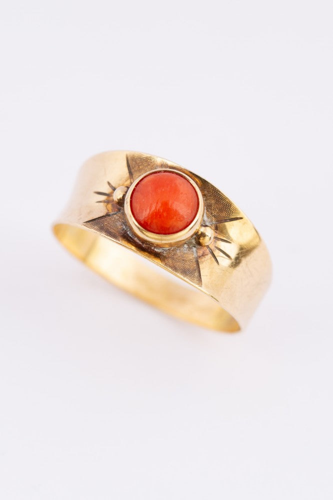 Gold ring with blood coral