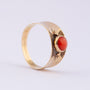 Gold ring with blood coral
