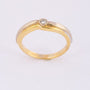 White/yellow gold ring with a brilliant